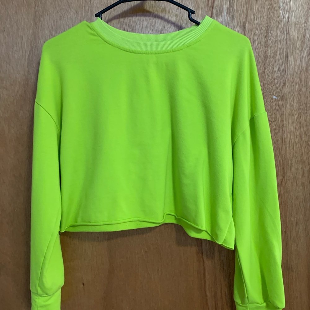 Neon green cropped long sleeve shirt with raw hem